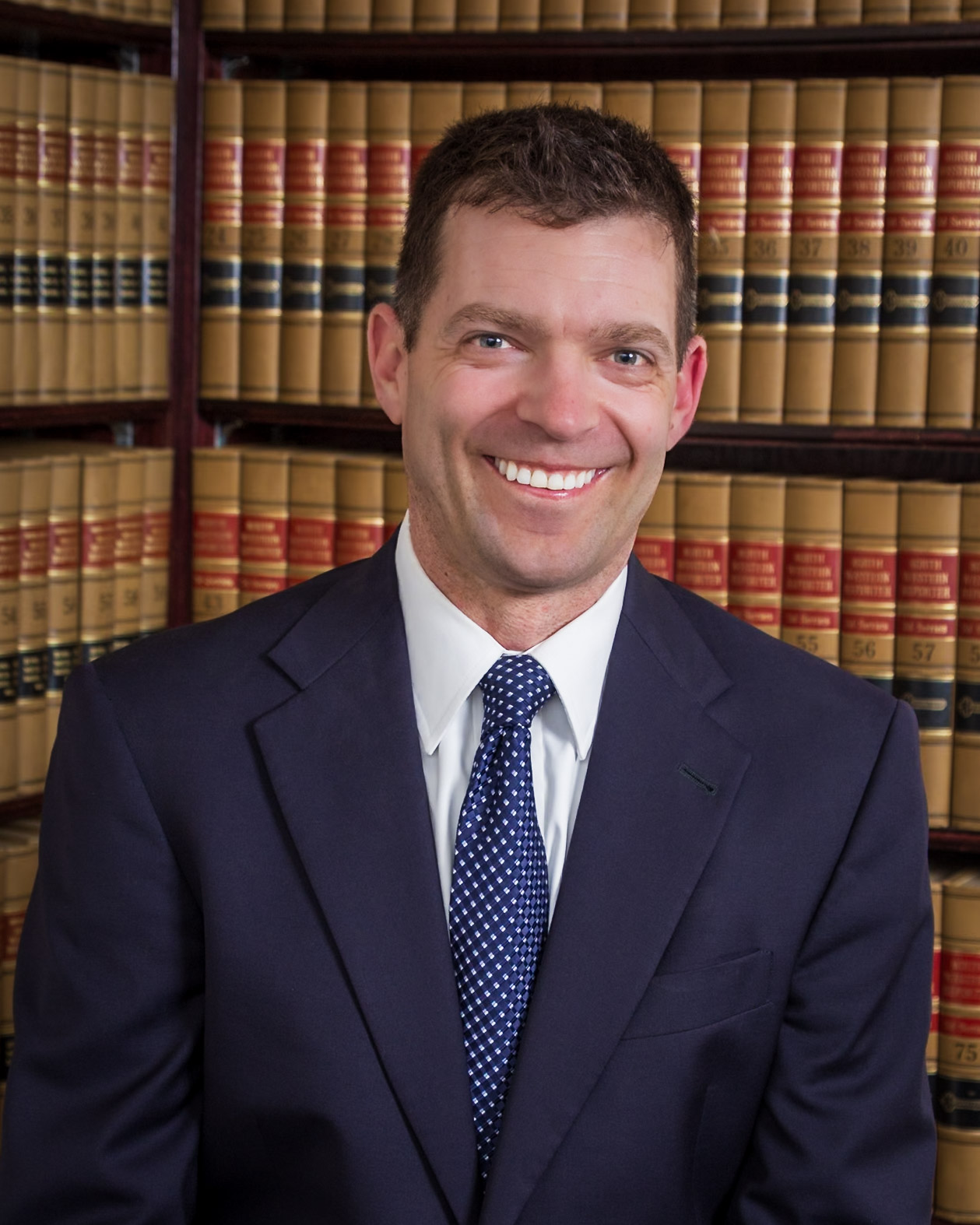 mediator gabe johnson picture with books in background